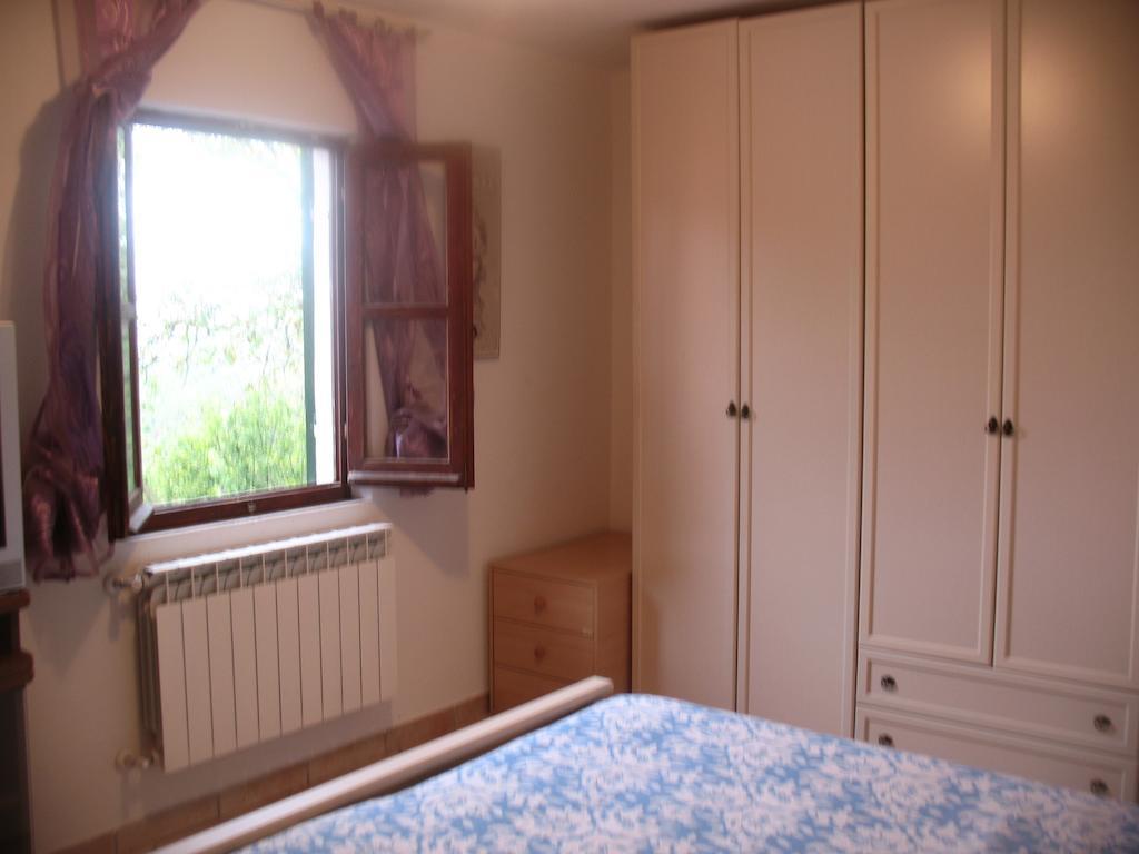 Casa Vacanze L'Agrifoglio Panzió Magliolo Szoba fotó